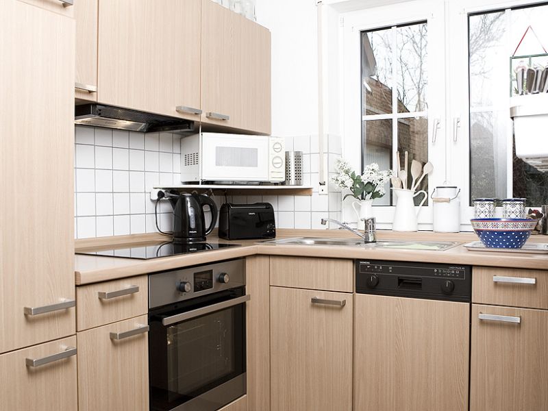 Küche mit Geschirrspüler im Haus Strand