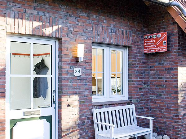 Eingang Haus Strand mit Bank